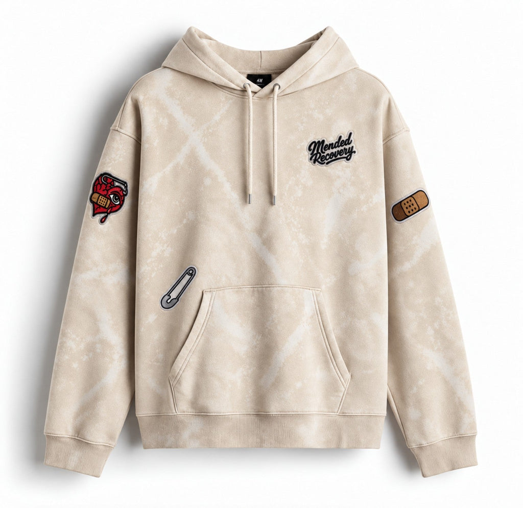 Cream distressed Mended Recovery hoodie – patch layout