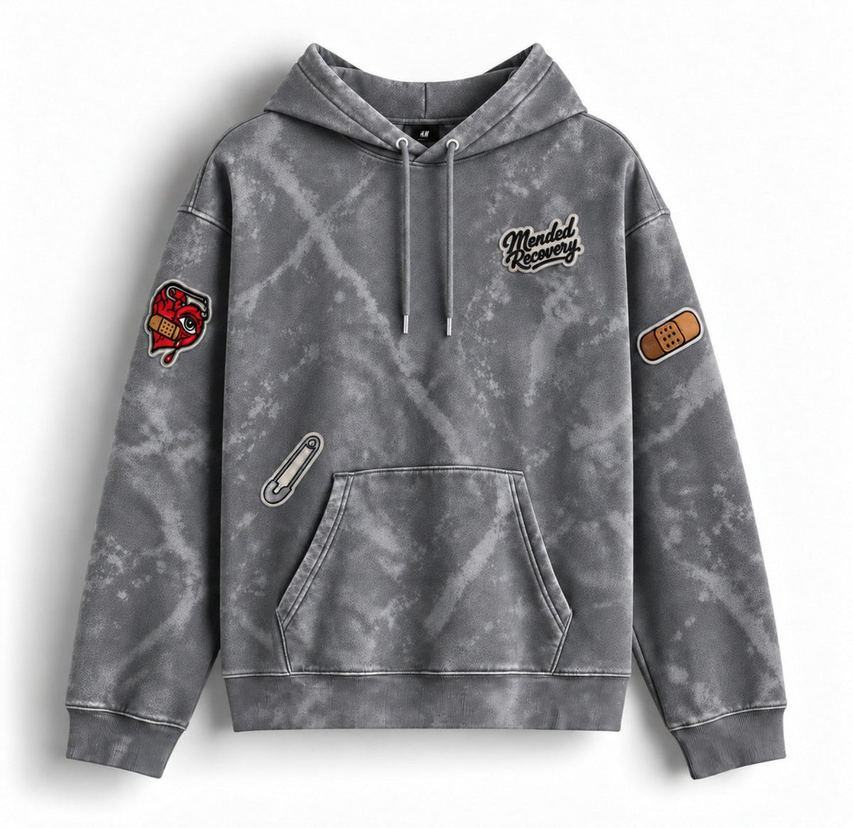 Gray distressed Mended Recovery hoodie – patch layout